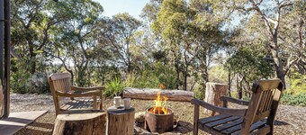 Nestled amongst the leafy trees, Gum Nuts a very Australian styled simple but sophisticated property