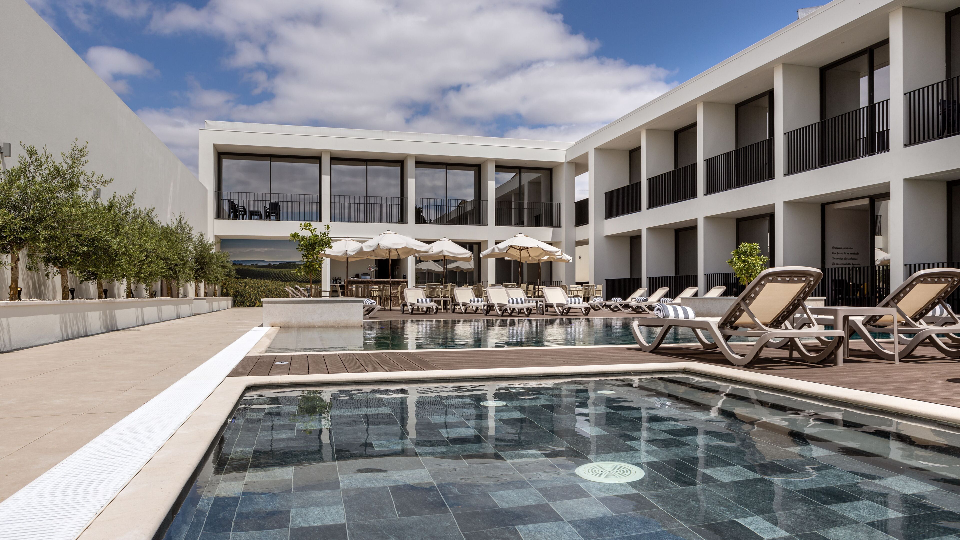 outdoor pool, open 8:00 am to 8:00 pm, pool umbrellas, pool loungers