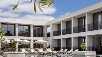 Outdoor pool, open 8:00 AM to 8:00 PM, pool umbrellas, sun loungers