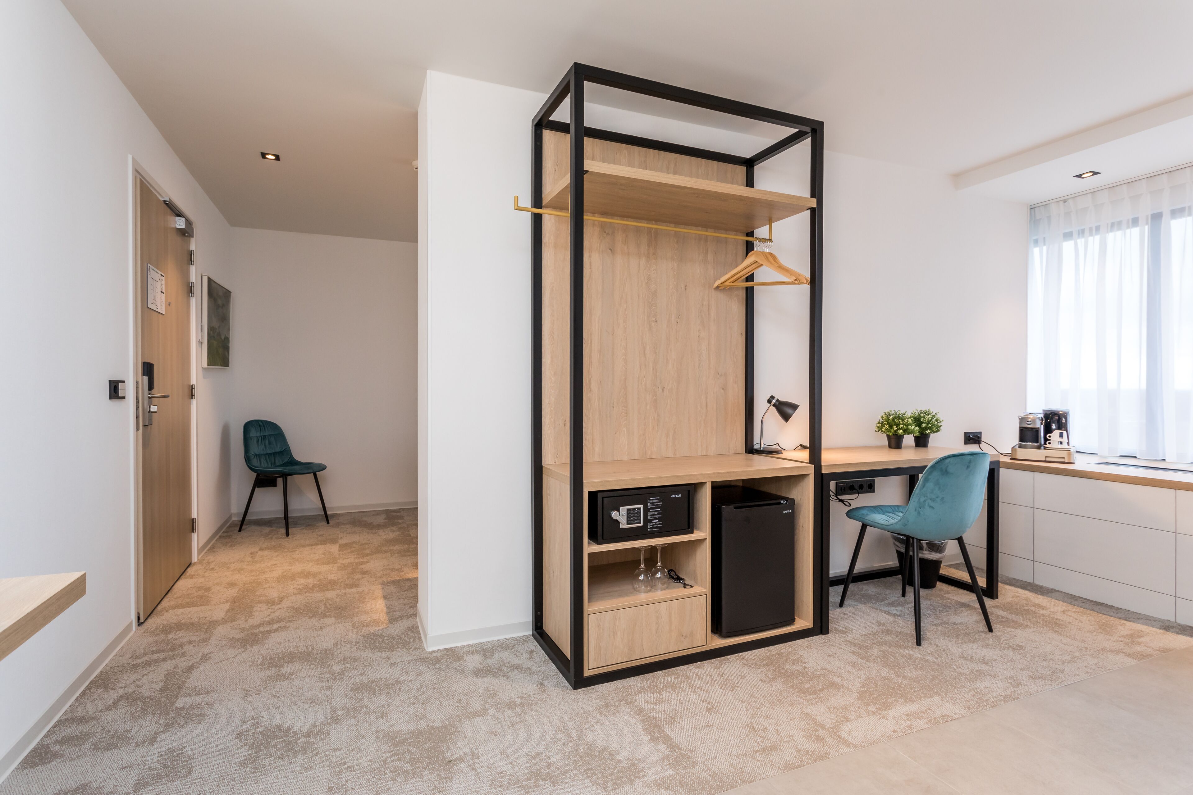 comfort suite (deluxe) | living area | 49-inch led tv with digital channels, tv, video game console