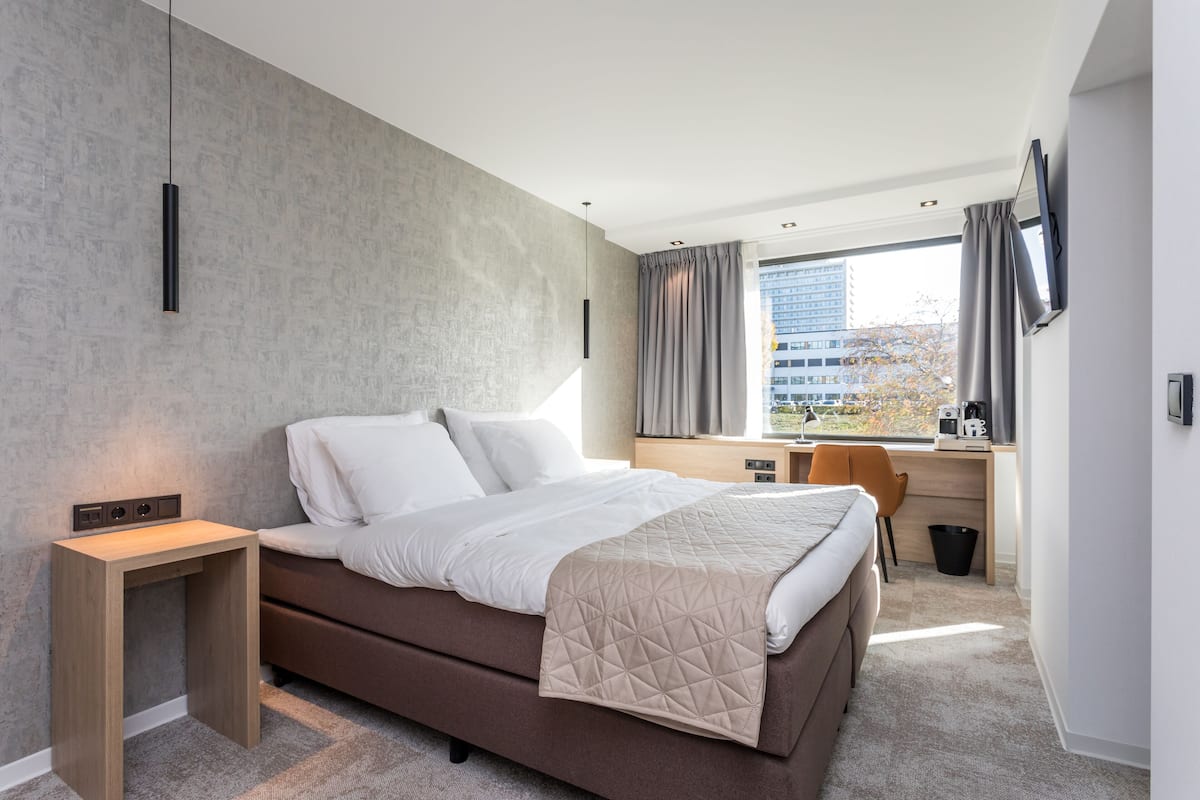 Suite Confort | 1 habitación, ropa de cama de alta calidad y edredón