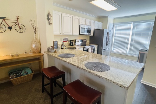 Fully renovated kitchen, gorgeous granite countertops and brand new appliances
