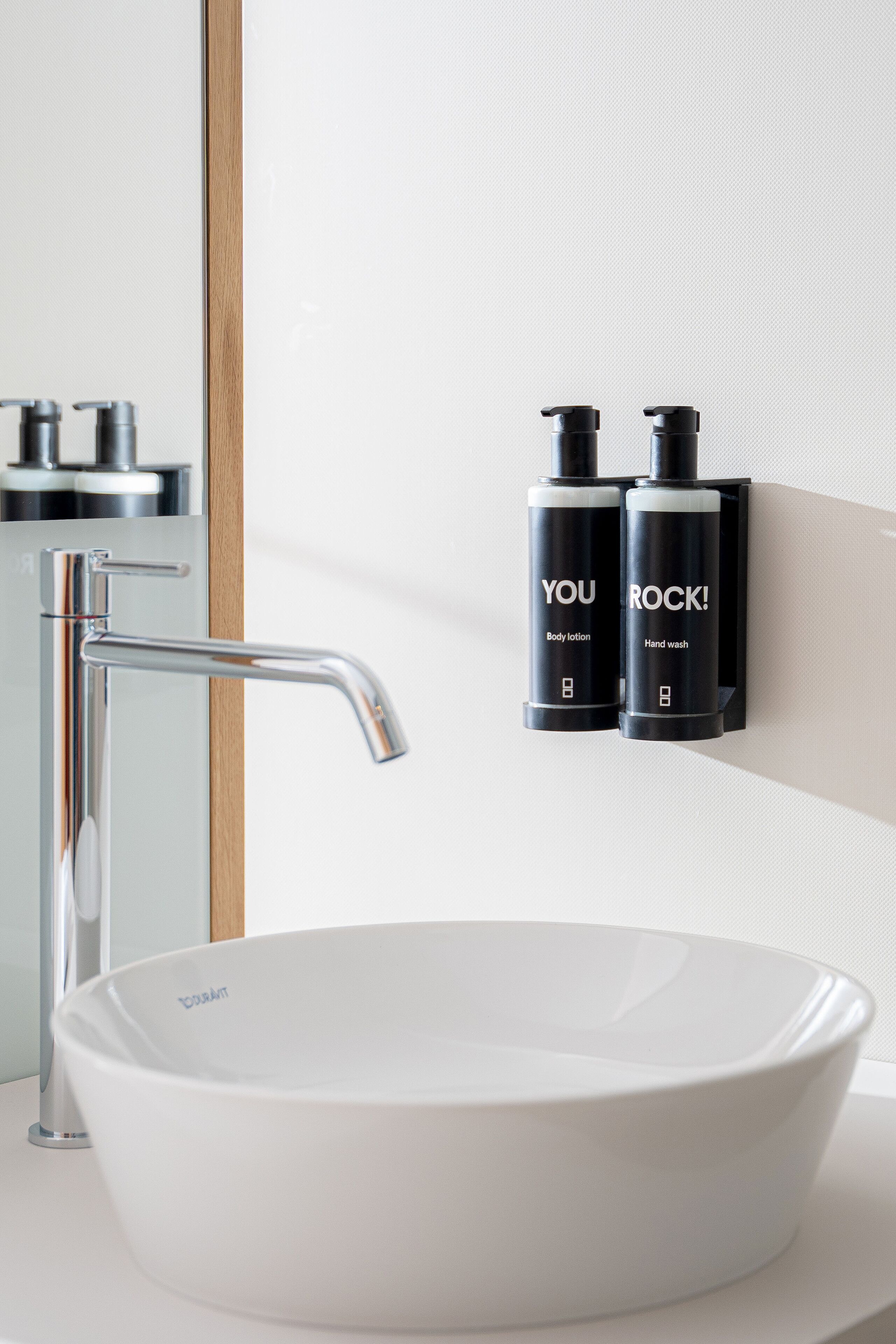 shower, bathrobes, slippers, towels