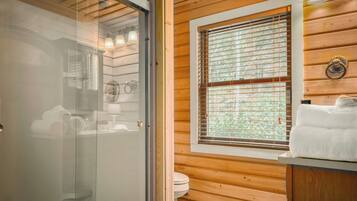 Combined shower/tub, hair dryer, towels, soap