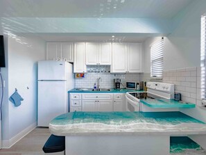 Fridge, microwave, oven, stovetop - Modern Beauty by the Beach Gulf View Balcony &Pool (St. Pete Beach)
