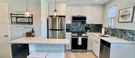 Refrigerador, microondas, horno y parrilla de estufa