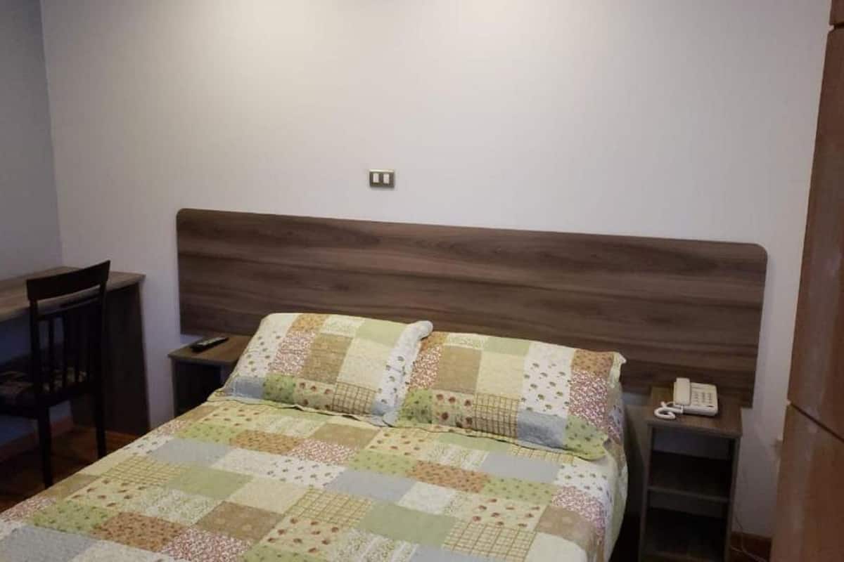 Desk, free WiFi, bed sheets
