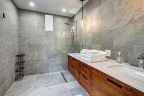 Bathtub, hair dryer, towels