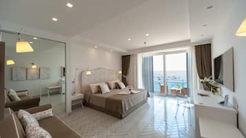 Suite, Balcony, Sea View | 1 bedroom, minibar, in-room safe, free WiFi