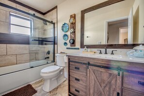 Combined shower/bathtub, hair dryer, towels, soap