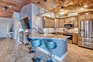 Fridge, microwave, oven, stovetop - Fun'n Sun - 3 BR/ 3 bath waterfront home in beautiful Matlacha Isles/ pool/ spa/ dock/ fishing poles (Matlacha Isles-Matlacha Shores)