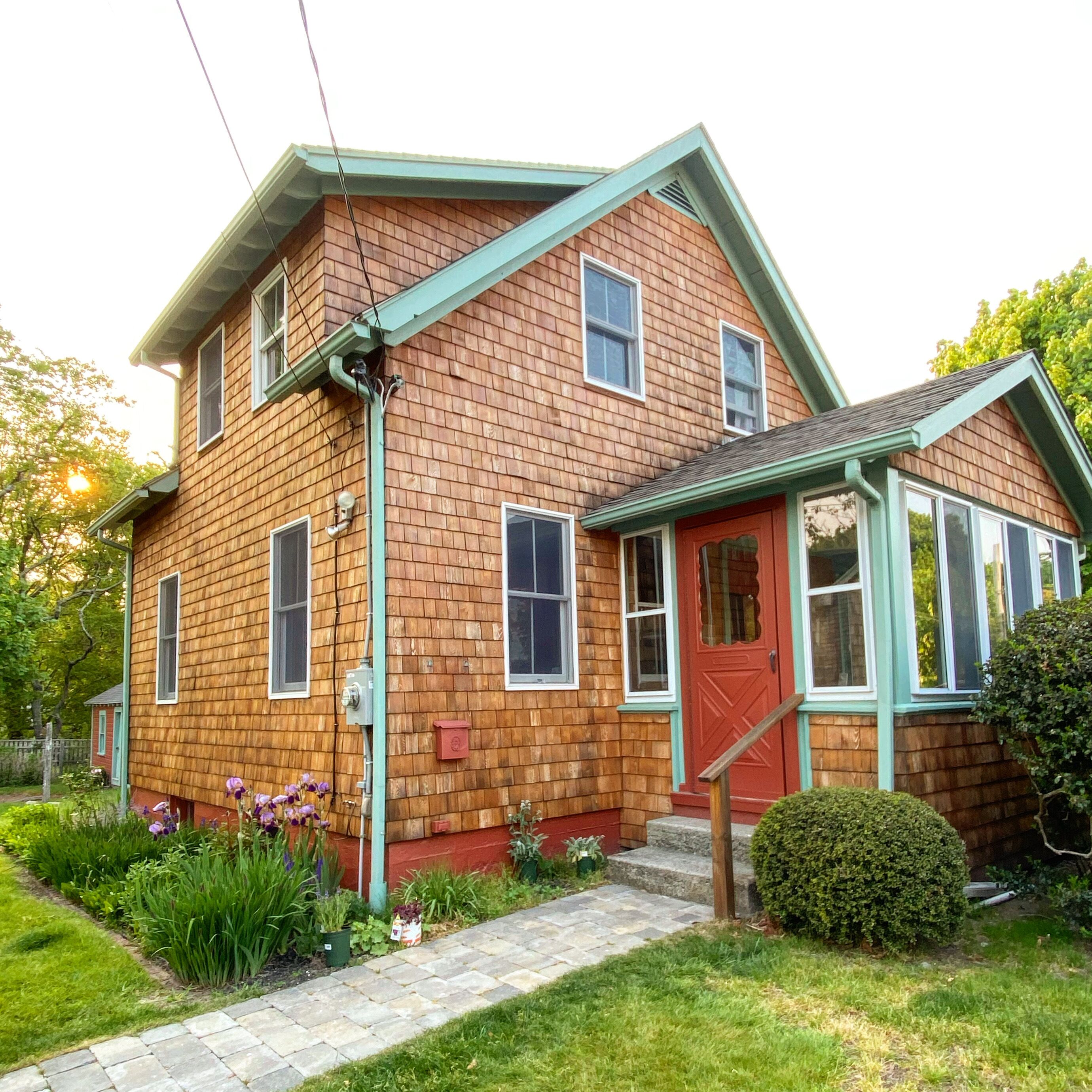 Cozy Village Cottage Within Walking Distance to the Beach and Downtown