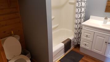 Premier Cottage | Bathroom | Combined shower/bathtub, hair dryer, soap, shampoo