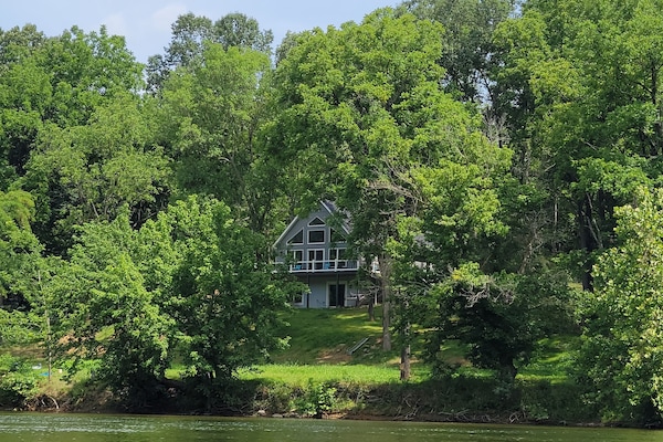Plenty of trees and riverbank for relaxing.