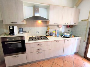Fridge, oven, cookware/dishes/utensils, dining tables - 2 Bedroom Apartment in Viareggio (Viareggio)