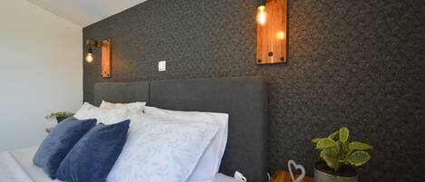 2 dormitorios, tabla de planchar con plancha, wifi gratis y ropa de cama