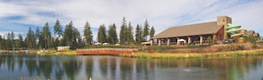 A lodge with a large building, a dock, and a lake. - Suncadia Resort (Cle Elum)