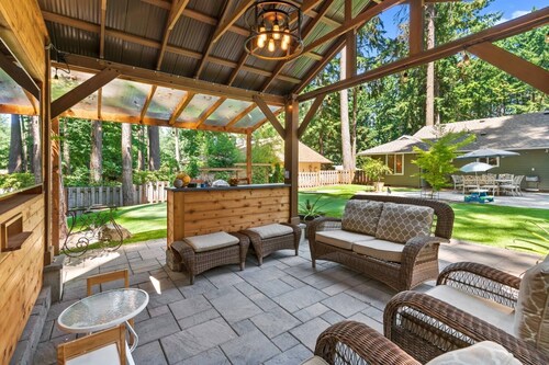 Phenomenal Single Level Home Featuring Incredible Outdoor Golf Option w/ Gazebo, Fire-Pit, and Patio