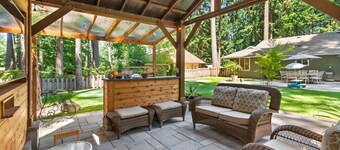 Phenomenal Single Level Home Featuring Incredible Outdoor Golf Option w/ Gazebo, Fire-Pit, and Patio