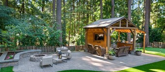 Phenomenal Single Level Home Featuring Incredible Outdoor Golf Option w/ Gazebo, Fire-Pit, and Patio