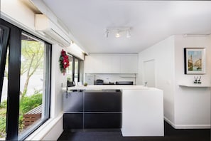 Fridge, microwave, toaster, cookware/dishes/utensils