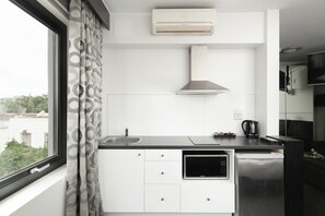 Fridge, microwave, toaster, cookware/dishes/utensils