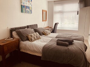 3 bedrooms, desk, iron/ironing board, travel cot