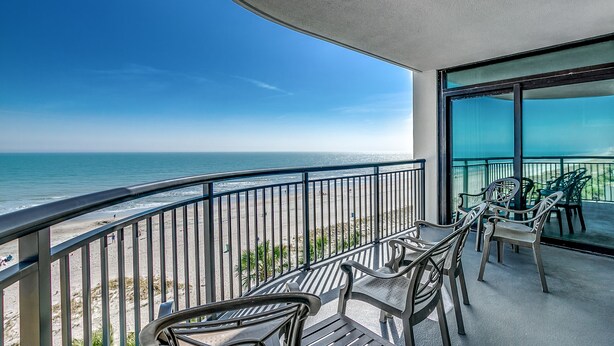 A balcony with a view of the beach and ocean. - 🌟Large Oceanfront~Lazy River~Awesome Amenities~ Caribbean Resort 503🌟 (Myrtle Beach)