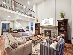 Smart TV, fireplace, ping pong, books