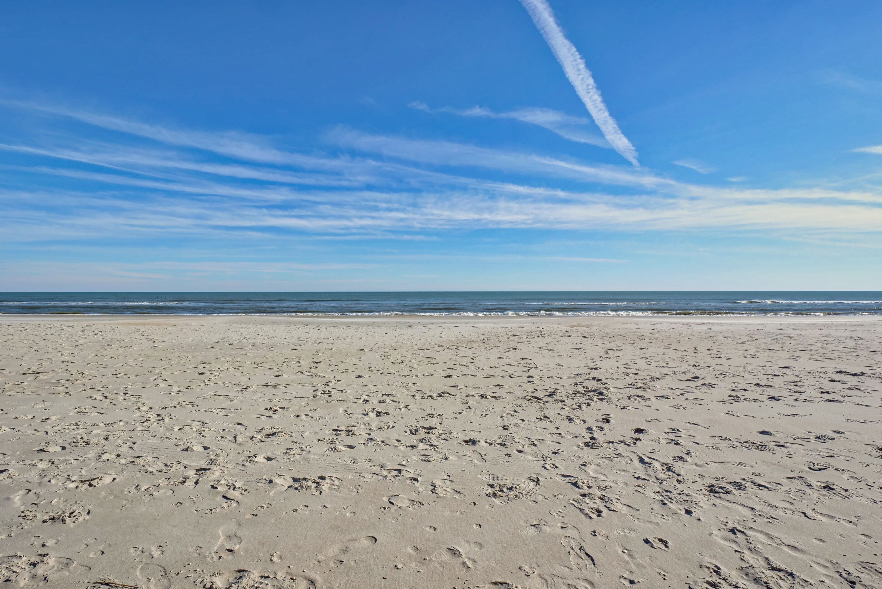 On the beach, sun loungers