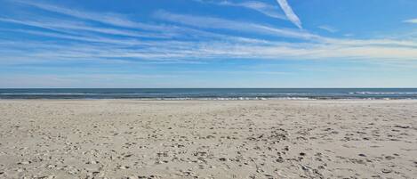 On the beach, sun loungers