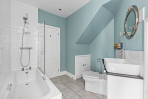 Combined shower/tub, hair dryer