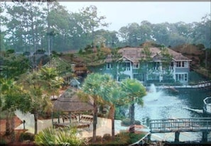 A large house with a pool and a gazebo.