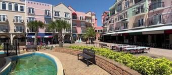 Relax and Revitalize: Retreat to European Village with Balcony, Close to Beaches