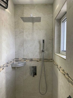 Shower, towels, toilet paper