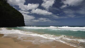On the beach, sun loungers, beach towels