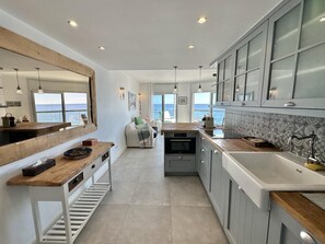 Fridge, microwave, dishwasher, coffee/tea maker