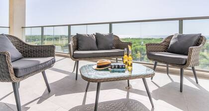 Sunlit Balcony & Coastal Charm by Sea N' Rent