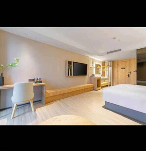 Habitación individual, vista a la ciudad | Área de sala de estar