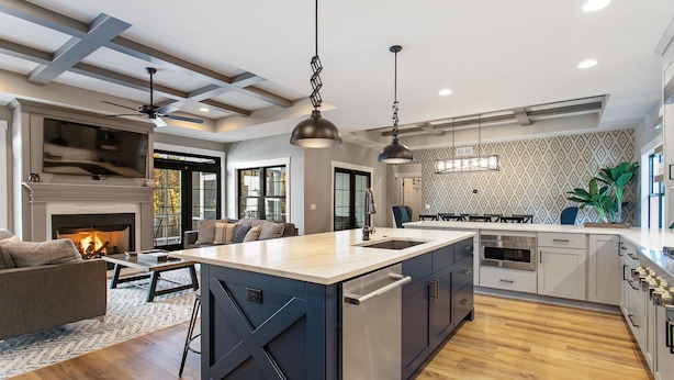 A modern kitchen with a central island, built-in appliances, and pendant lighting. - Luxury Property: Private Pool, Hot Tub, Fire Pit and Close to Lake Sunsets (Fennville)