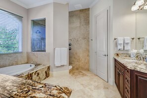 Shower, jetted tub, hair dryer, towels