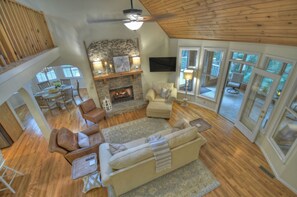 Smart TV, fireplace, foosball, books