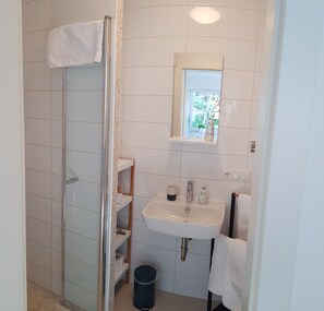 Shower, hair dryer, bathrobes, slippers