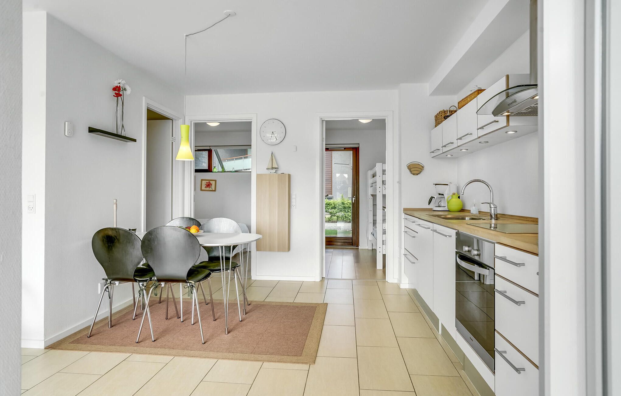 Fridge, stovetop, dishwasher, coffee/tea maker