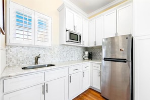 Fridge, microwave, coffee/tea maker, electric kettle