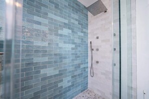 Combined shower/tub, hair dryer, towels, soap