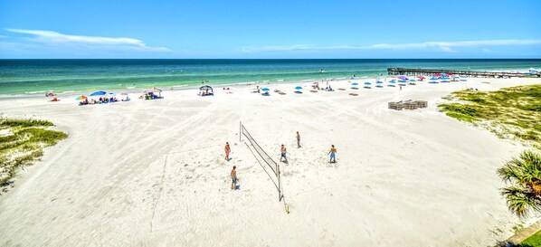 On the beach, sun loungers, beach towels