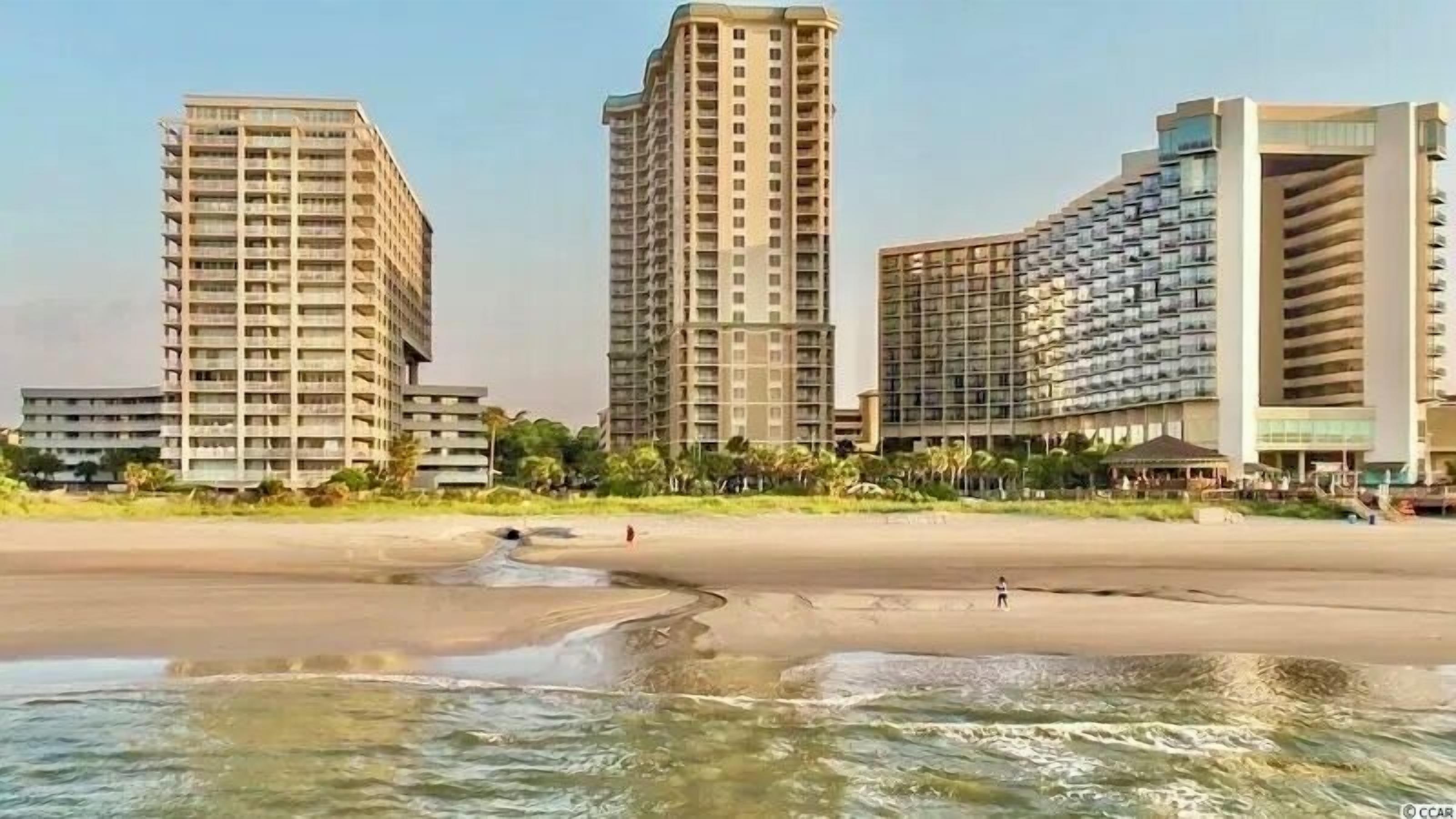 On the beach, sun-loungers, beach towels