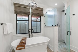 Bathtub, hair dryer, towels