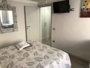 Apartment, 1 Schlafzimmer, Raucher, Stadtblick | 1 Schlafzimmer, WLAN, Bettwäsche